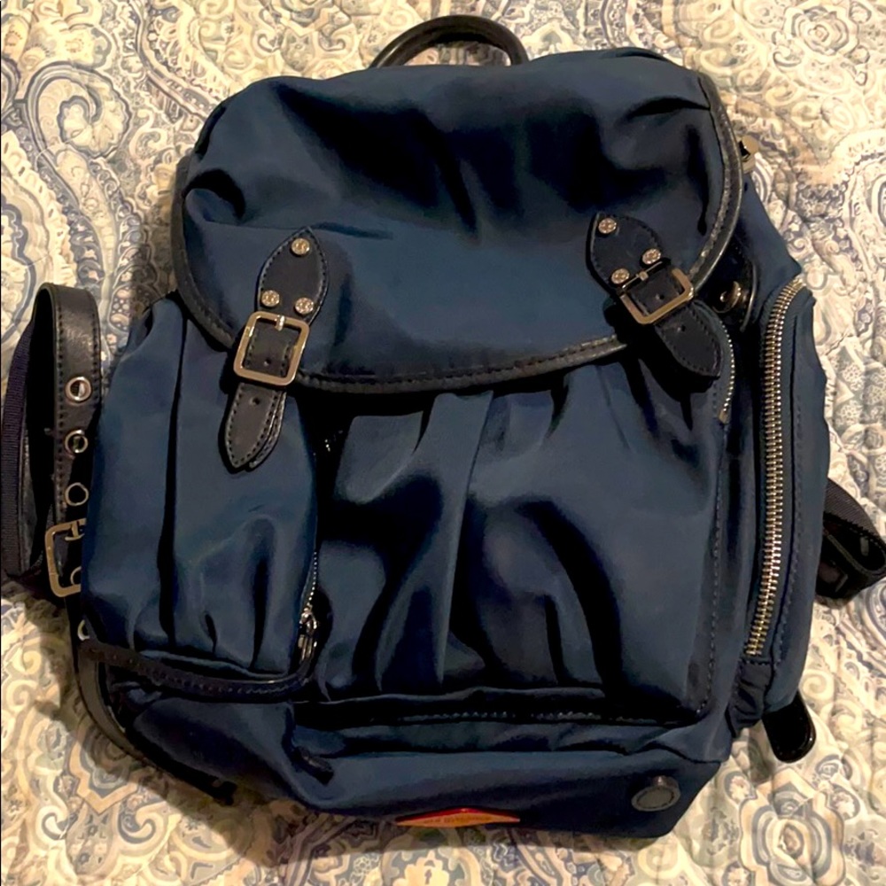 MZ Wallace Marlena backpack blue, tan inside. Designed to keep you hands-free.